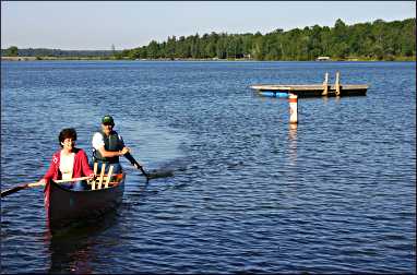 Canoeing at a lake resort.
