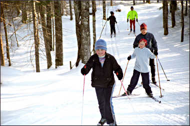 Skiers on trails at Afterglow Resort.