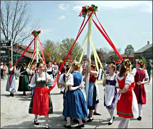 Dancers circle the maypole during Maifest in Amana.