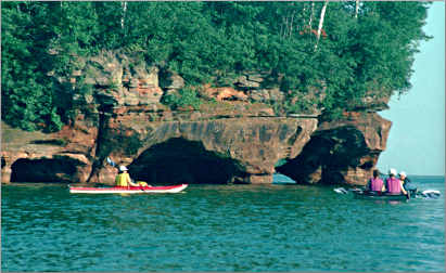 Kayakers at the Sand Island sea caves.