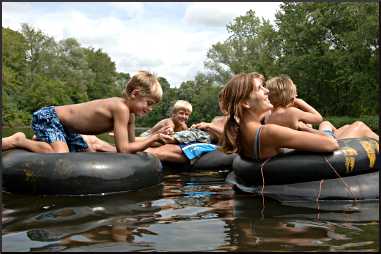 A family tubes on the Apple River.