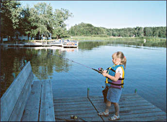 A girl fishing at a Brainerd resort.