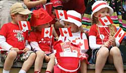 Children celebrate Canada Day at Fort William.