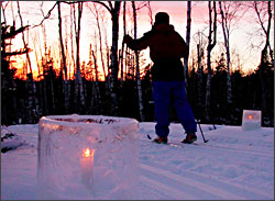Candlelight skiing in a state park.