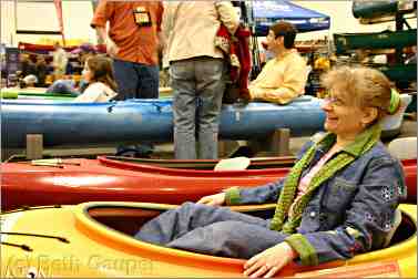 shopper for kayak at Canoecopia in Madison