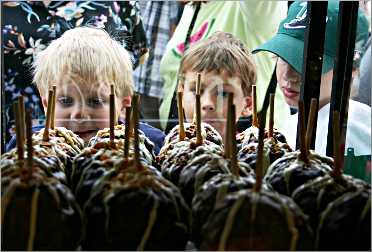 Kids look into a candy store in Cedarburg.
