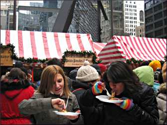 Eating potato pancakes at Christkindlmarket.