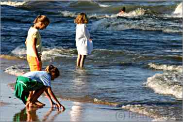 little girls at oak street beach in chicago