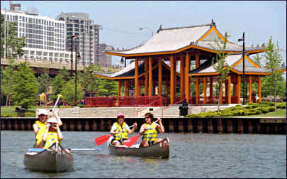 Canoeing in Chicago past Chinatown.