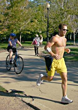 A runner passes Chicago's Oak Street Beach.