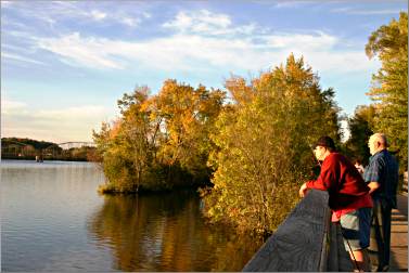 Two men fish in the Chippewa River from the Old Abe Trail.