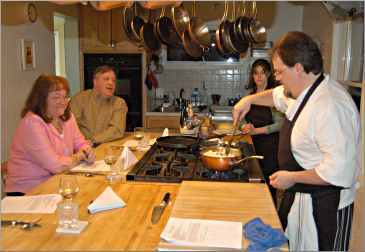 A chef teaching a cooking class.