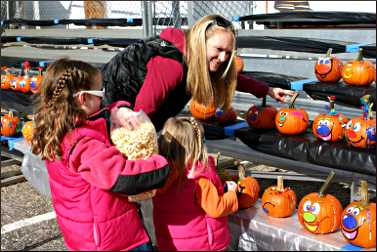 Pumpkin decorating in fall.