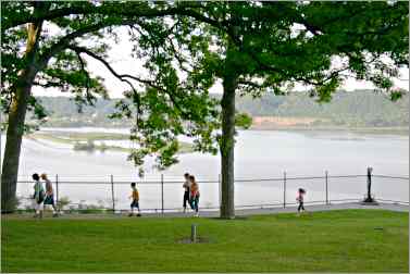 a family walks along Eagle Point Park in Dubuque