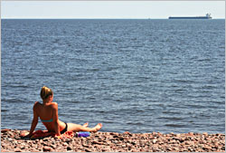 Sunbathing at Brighton Beach in Duluth.