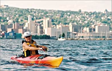 A kayaker paddles off Duluth's Park Point.