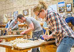 Students make their own canoe paddles.