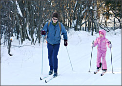 A family skies at Hartley Nature Center.