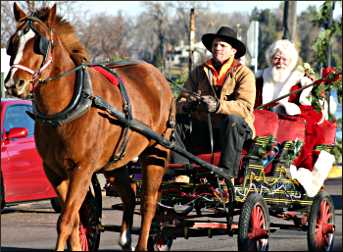 Santa arrives at Excelsior's Christkindlsmarkt.