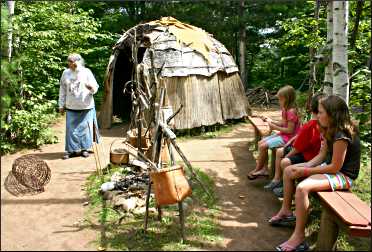 Learning about Ojibwe lifestyles.