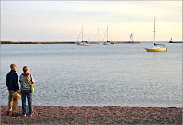 Cobblestones line Grand Marais' harbor.