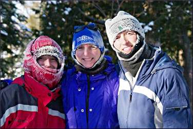 Three skiers on the Gunflint Trail.