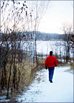 Walking in the snow in Lake Maria State Park.