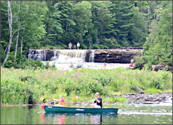 Canoeing past Lower Falls.