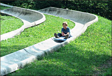 Riding the Alpine Slide on Lutsen Mountains.