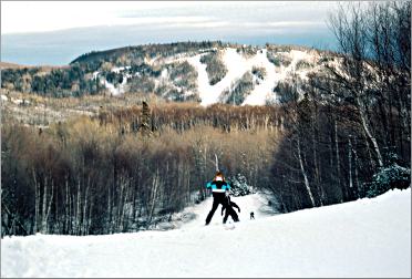 Skiers head down the mountain at Lutsen.