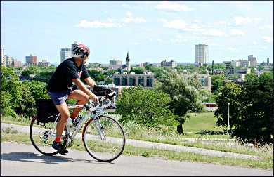 A bicyclist in Milwaukee's Reservoir Park.