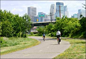 Bicyclists on Minneapolis' Cedar Lake Trail.