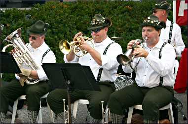 A German brass band plays.