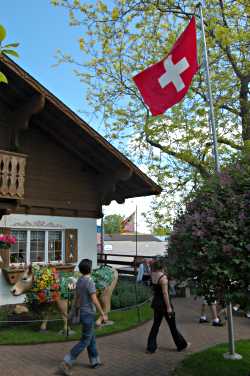 The Swiss flag flies over the Maple Leaf imports shop.