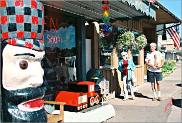 Shoppers stroll down the street in Nisswa.