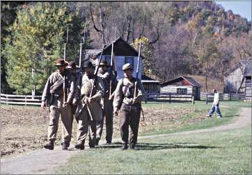 Civil War re-enactors march at Norskedalen.