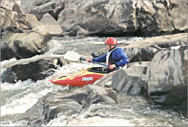 A kayaker fights his way through Missouri shut-ins.