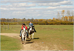 Riding horses around Pine River, Minn.