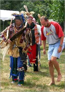A tourist dances at a Pipestone powwow.