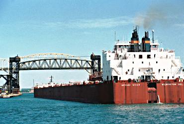 The Mesabi Miner heads out of Lake Superior through the Soo