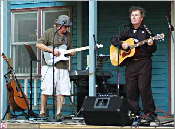 A Dylan impersonator sings at BobFest.