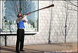 Blowing a naverlur at the American Swedish Institute.