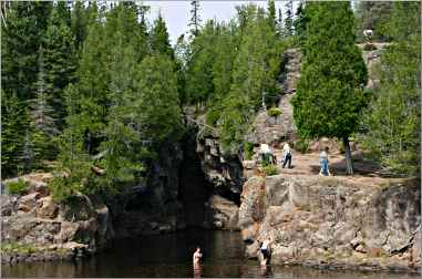 Swimmers at the mouth of the Temperance River.