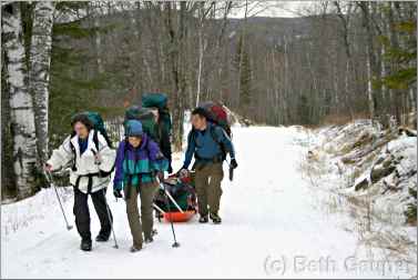 Guests pull supplies into Tettegouche Park.