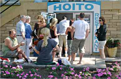 People wait in line outside Thunder Bay's Hoito restaurant.