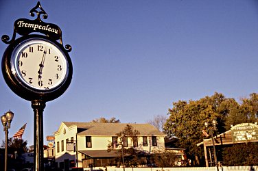 A vintage clock stands along Trempealeau's riverfront.