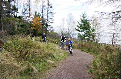 Bicyclists on the Sonju Trail in Two Harbors.